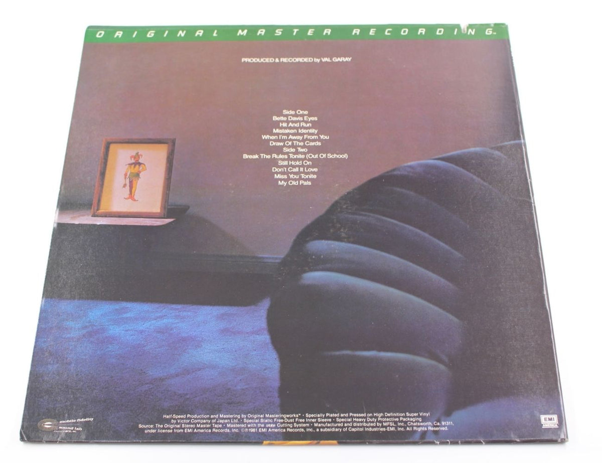 Kim Carnes - Mistaken Identity