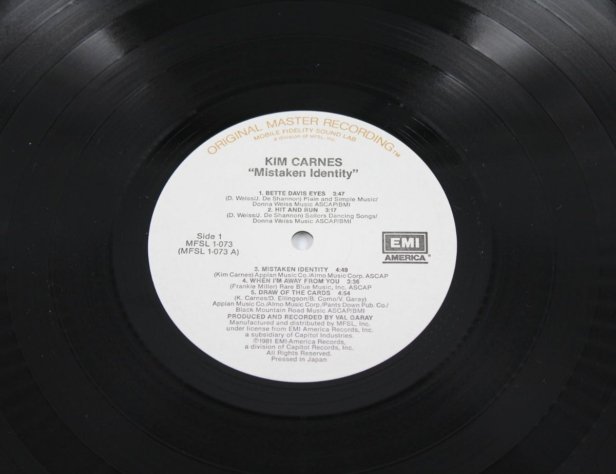 Kim Carnes - Mistaken Identity