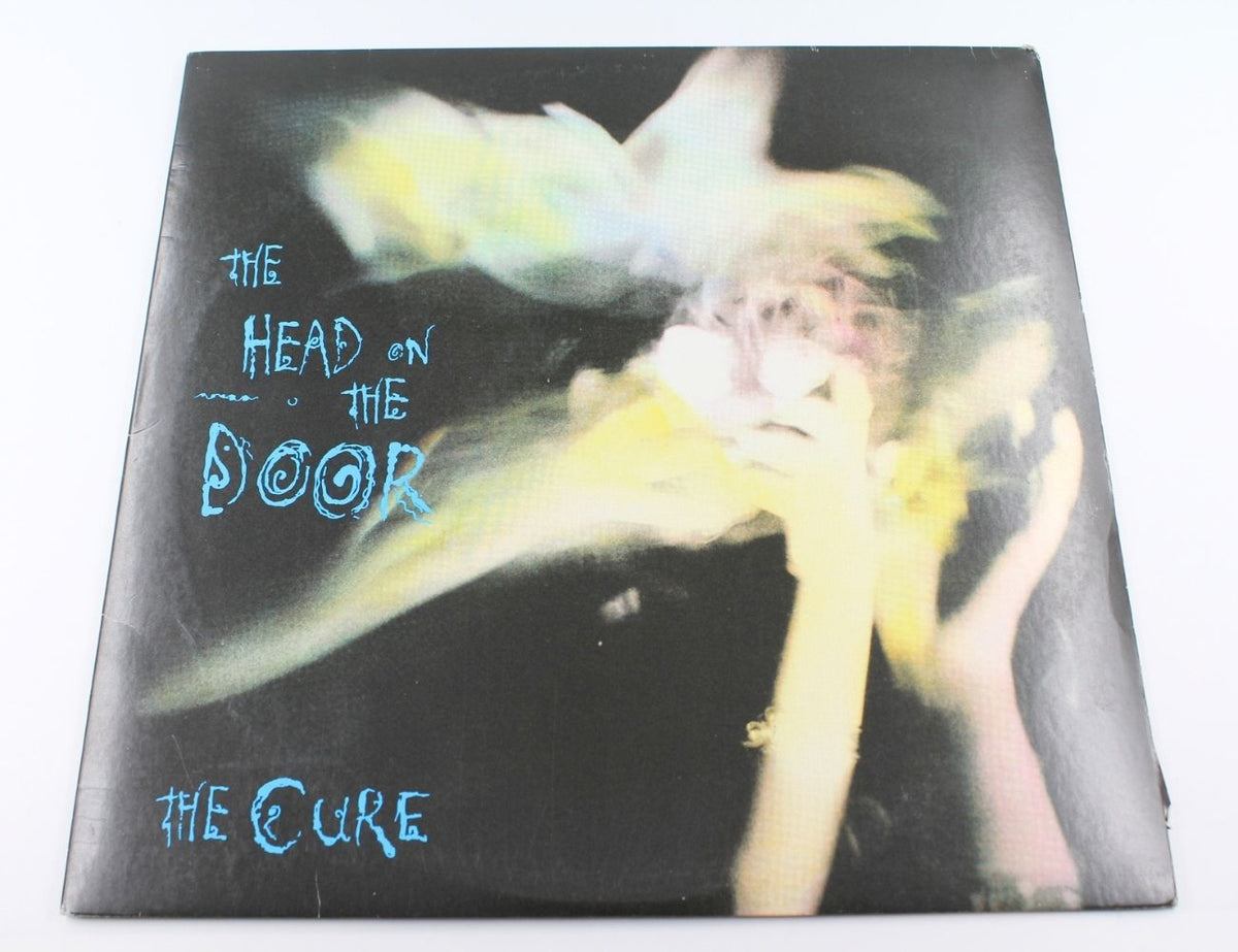 Cure - The Head On The Door